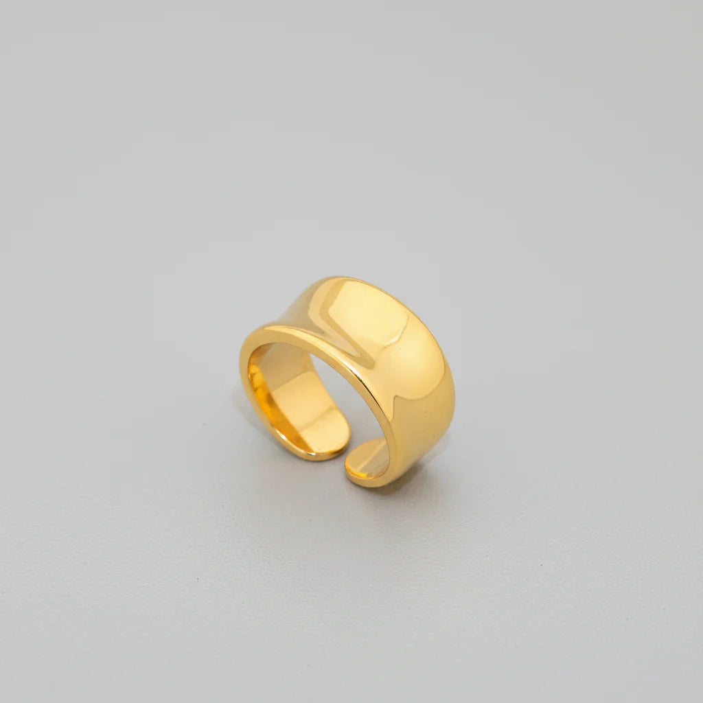 Gold ring on a white background