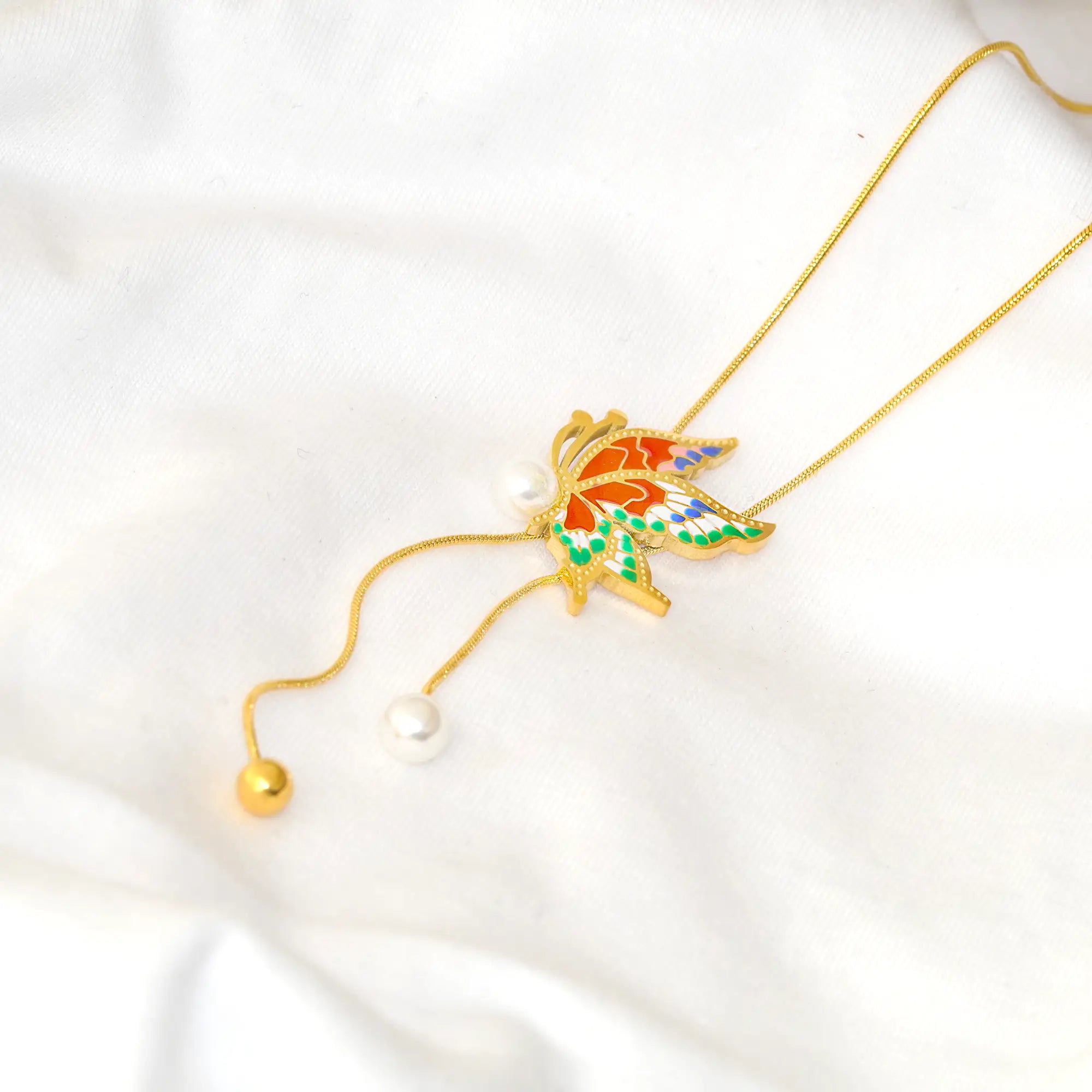 Decorative necklace with a colorful pendant on a white background