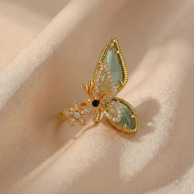 Golden butterfly statement ring front angle