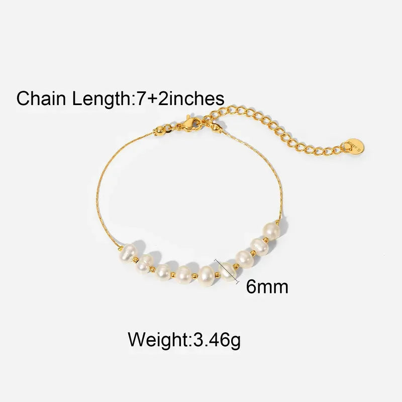 Gold bracelet with pearls on a white background, showing chain length, weight, and pearl size.