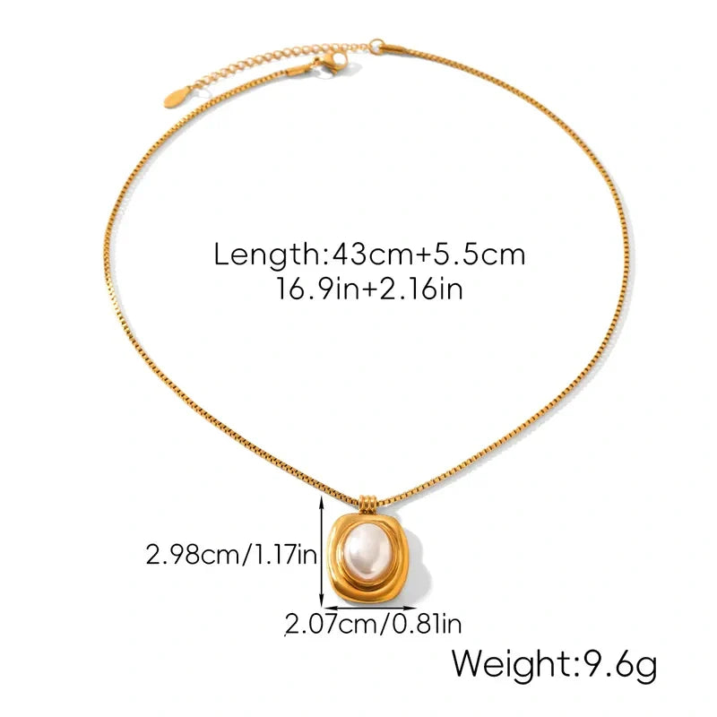 Gold necklace with a pearl pendant, showing measurements on a white background